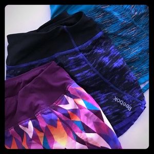 Three pairs of Reebok running shorts